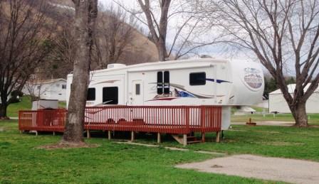 permanent camper enjoys a deck